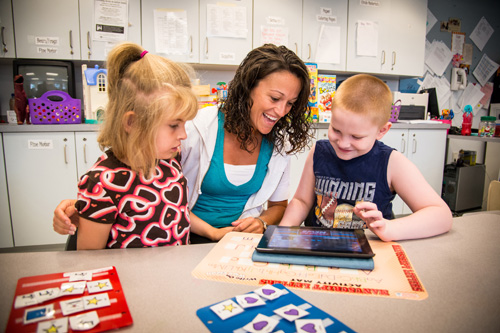 Barber National Institute - Teacher with Children